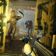 A first person screenshot of soldiers in hazmat suits fighting off attacking aliens.